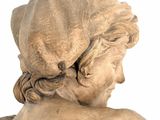 a statue of a woman with a hat on her head