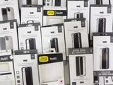 many boxes of electronic devices sitting on a table