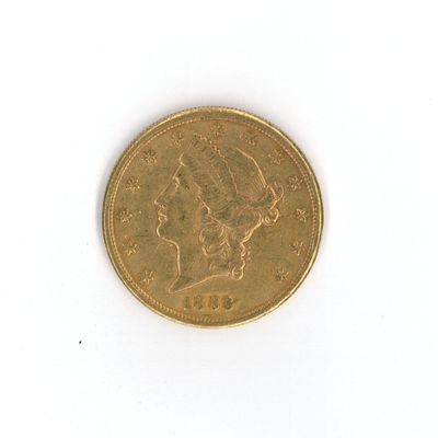 une pièce d'or avec l'image d'une femme dessus
