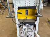 an image of a machine that is in a garage