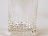 a glass that is sitting on a table