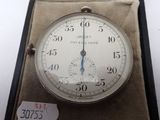 a clock that is on display in a case