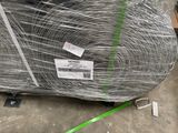 a large roll of wire wrapped in plastic on the ground