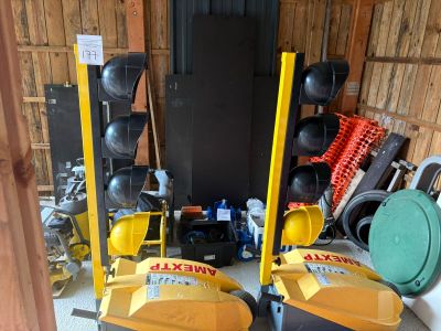 two machines that are sitting next to each other in the garage