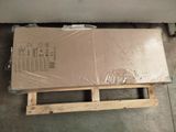 a pallet with a box on it sitting on the floor