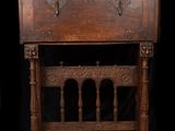 an old wooden table with a drawer on top of it