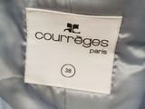 a close up of a label on a blue jacket