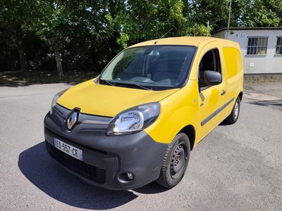 a yellow van that is parked in the parking lot