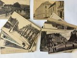 several old black and white photos of buildings and people on a street