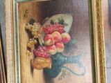 a picture of a painting on the wall next to a pair of shoes