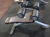 a machine that is sitting on the floor in the gym