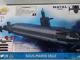 the box is open to show the model of a submarine