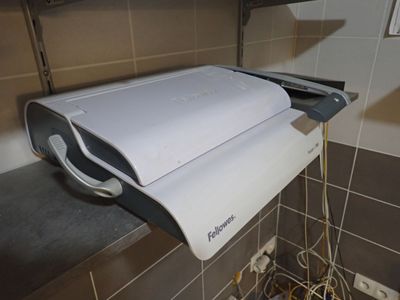 an image of a toilet paper dispenser in a bathroom