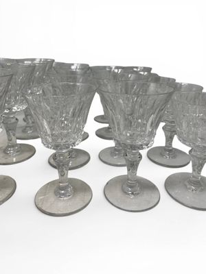 a lot of empty wine glasses on the table