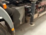 a large truck that is parked in a garage
