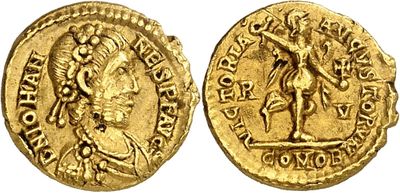 a gold coin with an image of a man holding a sword