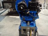 a blue machine that is sitting in a room