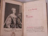 an old book with a picture of a woman on it