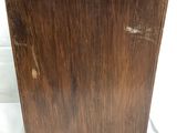 an old wooden box with peeling paint on it