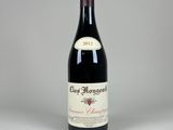 la bouteille de vin rouge est posée sur la table