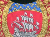 an image of a coat of arms with a ship on it