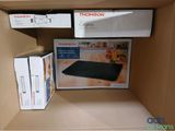 a cardboard box with a microwave on it and a box with a microwave on it