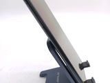 a close up of a cell phone on a stand