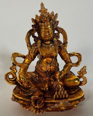 Dzambhala en bronze doré. Haut : 10 cm.