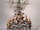 a chandelier hanging from the ceiling in a room