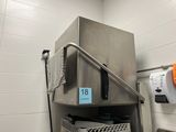 an image of a stainless steel refrigerator in a bathroom