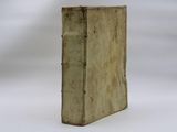 an old book that is sitting on a table