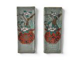 pair of asian style vases with flowers and birds on them