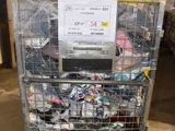 a metal cart with a bunch of items in it