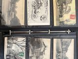 a bunch of old photos on a binder