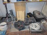 a lot of tools that are sitting on the floor