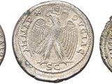 three silver coins of the roman empire, one of which is a woman and one of which is a man