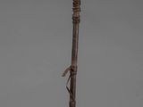 an image of a wooden pole with a bird on top of it