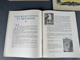 a book open on a table with a picture on it