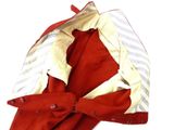a red jacket with a white shirt and a red tie