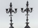 pair of antique bronze candelabs with birds and flowers