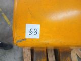 a small number on the side of a yellow chair