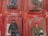 a lot of action figures that are in the package