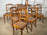 a lot of chairs that are arranged in a circle