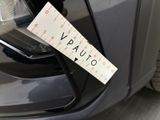 a parking ticket attached to the back of a car