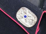 a close up of a button on a jacket