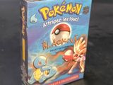 a box of pokemon cards sitting on a table