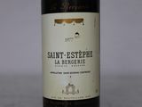 a bottle of wine that is sitting on a table