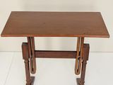 an image of a small table with a wooden top