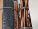 a box with a bicycle tire and a tube in it
