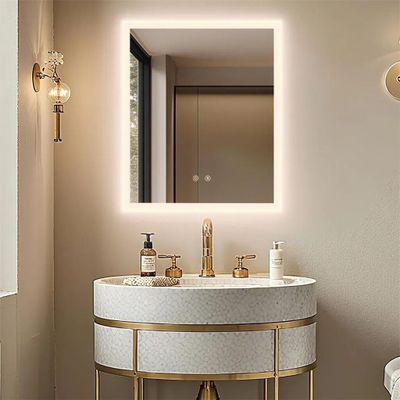 a bathroom with a sink, mirror, and toilet in it
